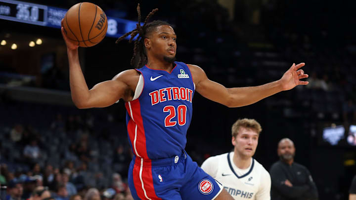 Oct 6, 2025; Memphis, Tennessee, USA; Detroit Pistons guard Chaz Lanier (20) saves the ball from going out of bounds during the fourth quarter against the Memphis Grizzlies at FedExForum. Mandatory Credit: Petre Thomas-Imagn Images