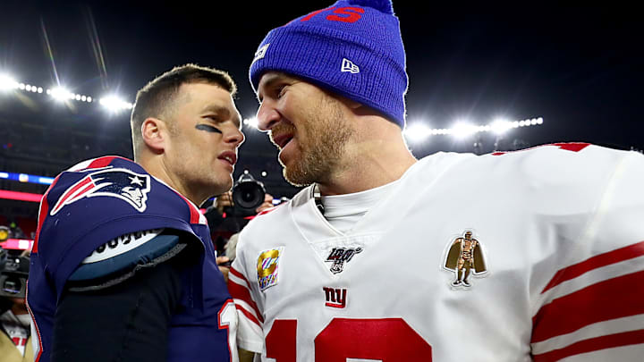 Tom Brady (L) and Eli Manning (R)