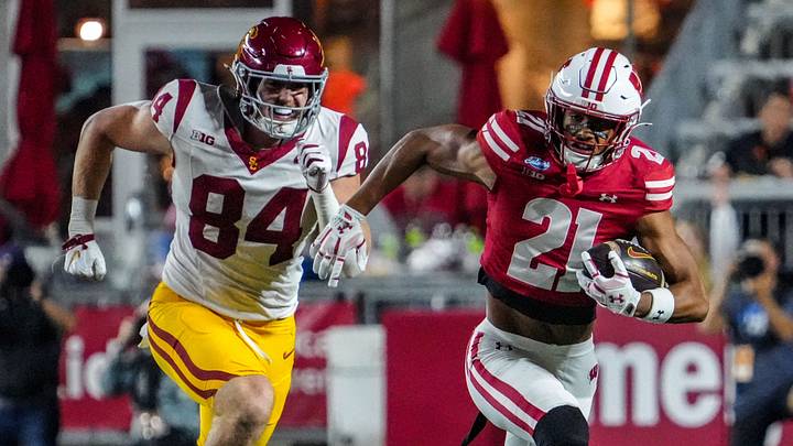 Wisconsin Badgers safety Cairo Skanes (21) races downfield after intercepting a pass in the game against USC, Oct. 24, 2026, at Camp Randall Stadium in Madison, Wisconsin.