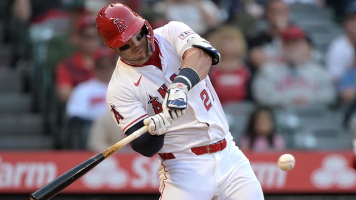 Jun 9, 2025; Anaheim, California, USA;   Los Angeles Angels right fielder Mike Trout (27) singles in a run in the third inning against the Athletics at Angel Stadium. Mandatory Credit: Jayne Kamin-Oncea-Imagn Images