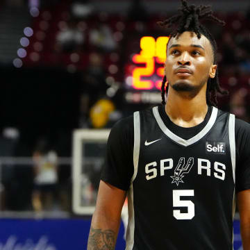 Jul 13, 2024; Las Vegas, NV, USA; San Antonio Spurs guard Stephon Castle (5) walks up court during the third quarter against the Portland Trail Blazers at Thomas & Mack Center. Mandatory Credit: Stephen R. Sylvanie-USA TODAY Sports