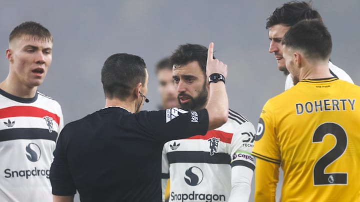 Bruno Fernandes (center right) will miss Manchester United's last game of 2024.