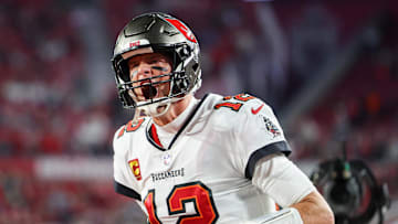 Tampa Bay Buccaneers quarterback Tom Brady takes the field before a wild card game against the Dallas Cowboys.