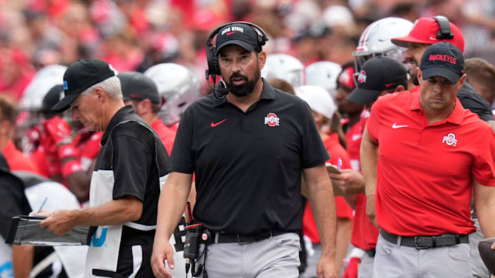Aug 31, 2024; Columbus, OH, USA; Ohio State Buckeyes head coach Ryan Day watches from the sideline during the first half of the NCAA football game against the Akron Zips at Ohio Stadium.