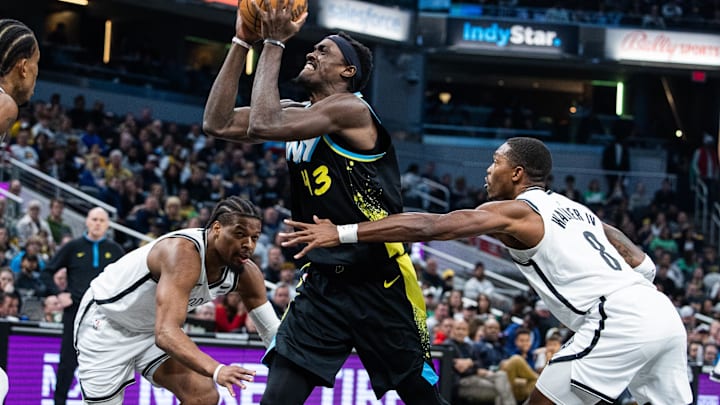 Mar 16, 2024; Indianapolis, Indiana, USA; Indiana Pacers forward Pascal Siakam (43) shoots the ball while Brooklyn Nets guard Lonnie Walker IV (8) defends in the first half at Gainbridge Fieldhouse. Mandatory Credit: Trevor Ruszkowski-Imagn Images