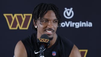 Jul 26, 2024; Ashburn, VA, USA; Washington Commanders quarterback Jayden Daniels speaks with the media after morning practice on day three of training camp at Commanders Park. Mandatory Credit: Geoff Burke-USA TODAY Sports