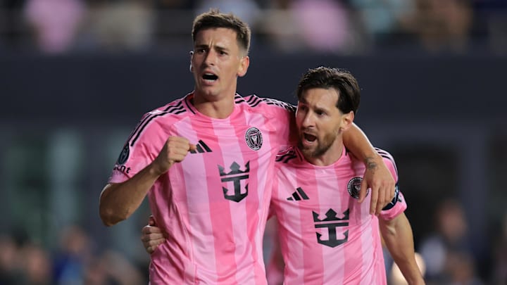 Inter Miami CF forward Tadeo Allende (left) celebrates with forward Lionel Messi (right) after scoring against Sporting Kansas City.