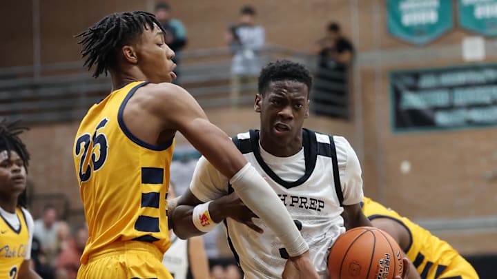 Jan 4, 2025; Gilbert, AZ, USA; Utah Prep Academy forward AJ Dybantsa (3) against Faith Family Academy (TX) forward Davion Adkins (25) during the Hoophall West High School Invitational at Highland High School. Mandatory Credit: Mark J. Rebilas-Imagn Images