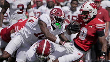 Wisconsin's Vinny Anthony II (8) is tackled by on a punt return during the third quarter of their game Saturday, September 14, 2024 at Camp Randall Stadium in Madison, Wisconsin. Alabama beat Wisconsin 42-10.