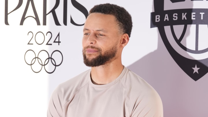 Aug 5, 2024; Paris, FRANCE; United States shooting guard Stephen Curry (4) poses for a photograph during the Paris 2024 Olympic Summer Games at Team USA House. Mandatory Credit: John David Mercer-USA TODAY Sports