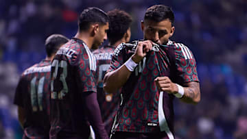 Alexis Vega (right) opened the scoring for Mexico with a free-kick goal