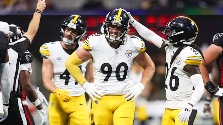 Sep 8, 2024; Atlanta, Georgia, USA; Pittsburgh Steelers linebacker T.J. Watt (90) reacts with cornerback Donte Jackson (26) after a penalty against the Atlanta Falcons in the second quarter at Mercedes-Benz Stadium. Mandatory Credit: Brett Davis-Imagn Images