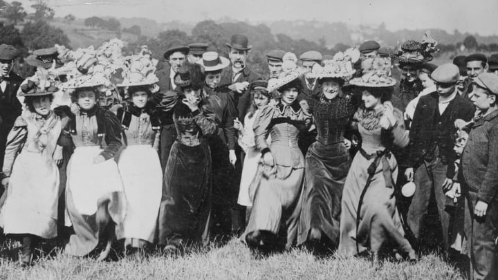 A holiday crowd, complete with Easter bonnets, dancing on London's Hampstead Heath in 1892.