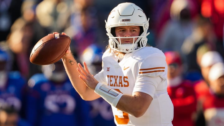 Nov 19, 2022; Lawrence, Kansas, USA; Texas Longhorns quarterback Quinn Ewers (3) throws a pass during the first half against the Kansas Jayhawks at David Booth Kansas Memorial Stadium.