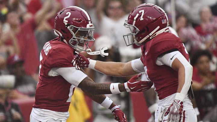 Aug 31, 2024; Tuscaloosa, Alabama, USA;  Alabama Crimson Tide wide receiver Ryan Williams (2) celebrates with wide receiver Cole Adams (7) after scoring a touchdown against the Western Kentucky Hilltoppers during the first half at Bryant-Denny Stadium.  Mandatory Credit: Gary Cosby Jr.-Imagn Images