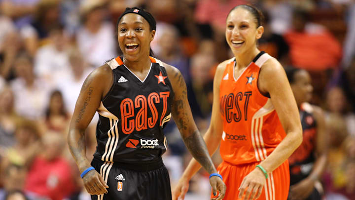 Jul 27, 2013; Uncasville, CT, USA; Eastern Conference guard Cappie Pondexter (23) of the New York Liberty and Western Conference guard Diana Taurasi (03) of the Phoenix Mercury smile during the 2013 WNBA All Star Game at Mohegan Sun Arena. Mandatory Credit: Danny Wild-Imagn Images