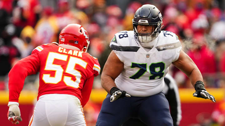 Dec 24, 2022; Kansas City, Missouri, USA; Seattle Seahawks offensive tackle Stone Forsythe (78) looks to block Kansas City Chiefs defensive end Frank Clark (55) during the second half at GEHA Field at Arrowhead Stadium. Mandatory Credit: Jay Biggerstaff-Imagn Images