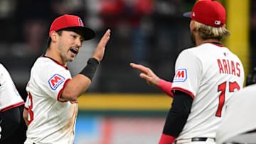 Apr 21, 2025; Cleveland, Ohio, USA; Cleveland Guardians left fielder Steven Kwan (38) is congratulated by second baseman Gabriel Arias (13) after the Cleveland Guardians defeated the New York Yankees at Progressive Field. Mandatory Credit: David Dermer-Imagn Images