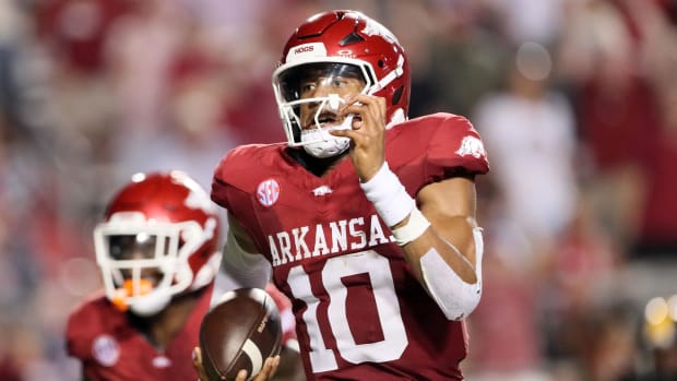 Razorbacks quarterback Taylen Green (10) rushes for a touchdown in the second quarter against UAPB.