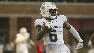 Sep 7, 2024; College Park, Maryland, USA; Michigan State Spartans wide receiver Nick Marsh (6) runs for a touchdown after a catch during the second half  against the Maryland Terrapins at SECU Stadium. Mandatory Credit: Tommy Gilligan-Imagn Images