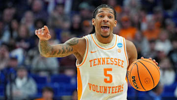 Mar 22, 2025; Lexington, KY, USA; Tennessee Volunteers guard Zakai Zeigler (5) brings the ball up court during the first half against the UCLA Bruins in the second round of the NCAA Tournament at Rupp Arena. Mandatory Credit: Aaron Doster-Imagn Images
