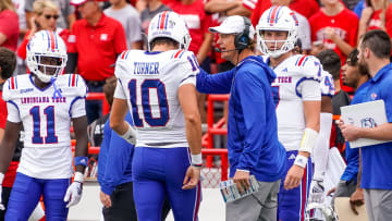 Sep 23, 2023; Lincoln, Nebraska, USA; Louisiana Tech Bulldogs head coach Sonny Cumbie talks with quarterback Jack Turner (10) during the first quarter against the Nebraska Cornhuskers at Memorial Stadium. Mandatory Credit: Dylan Widger-USA TODAY Sports