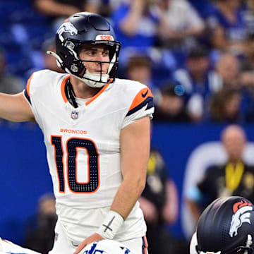 Aug 11, 2024; Indianapolis, Indiana, USA; Denver Broncos quarterback Bo Nix (10) points during the second quarter against the Indianapolis Colts at Lucas Oil Stadium. Mandatory Credit: Marc Lebryk-Imagn Images