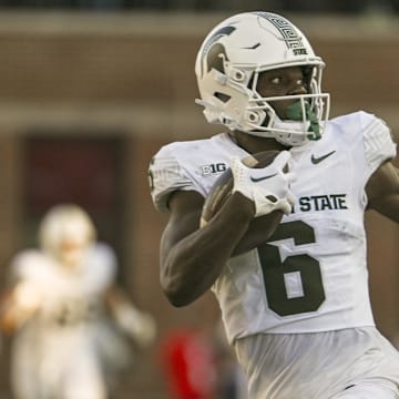 Sep 7, 2024; College Park, Maryland, USA; Michigan State Spartans wide receiver Nick Marsh (6) runs for a touchdown after a catch during the second half  against the Maryland Terrapins at SECU Stadium. Mandatory Credit: Tommy Gilligan-Imagn Images