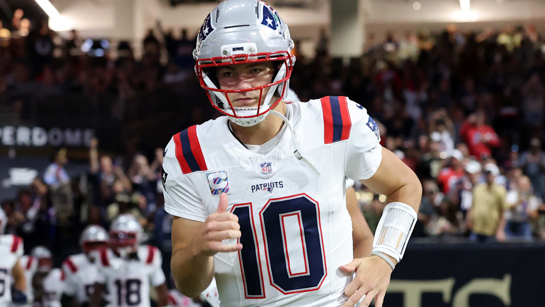 New England Patriots quarterback Drake Maye celebrates a touchdown against the New Orleans Saints.