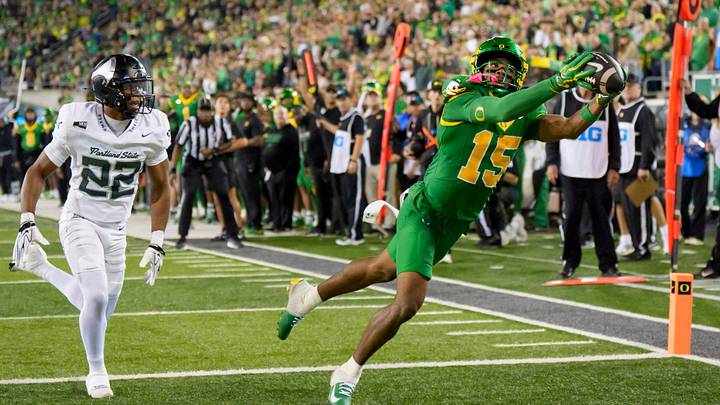 Oregon wide receiver Messiah Hampton hauls in a touchdown under cover from Portland State cornerback DaMari Washington as the Oregon Ducks host the Portland State Vikings on Sept. 18, 2026, at Autzen Stadium in Eugene, Oregon.