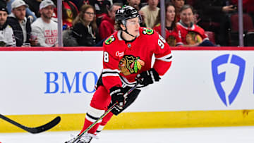 Feb 5, 2025; Chicago, Illinois, USA; Chicago Blackhawks center Connor Bedard (98) skates with the puck against the Edmonton Oilers during the second period at the United Center. Mandatory Credit: Daniel Bartel-Imagn Images