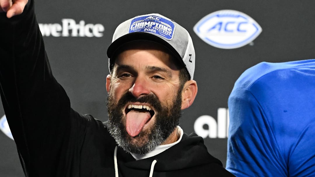 Dec 6, 2025; Charlotte, NC, USA; Duke Blue Devils head coach Manny Diaz celebrates defeating the Virginia Cavaliers at the 2025 ACC Championship game at Bank of America Stadium. Mandatory Credit: Bob Donnan-Imagn Images