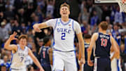 Mar 27, 2025; Newark, NJ, USA; Duke Blue Devils forward Cooper Flagg (2) reacts after making a last second shot to end the first half against the Arizona Wildcats during an East Regional semifinal of the 2025 NCAA tournament at Prudential Center. Mandatory Credit: Robert Deutsch-Imagn Images