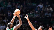 Dec 12, 2024; Boston, Massachusetts, USA; Boston Celtics guard Jaylen Brown (7) shoots the ball against Detroit Pistons guard Jaden Ivey (23)during the first half at TD Garden. Mandatory Credit: Eric Canha-Imagn Images
