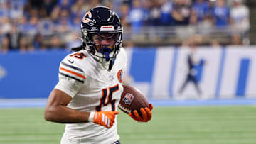 Sep 14, 2025; Detroit, Michigan, USA; Chicago Bears wide receiver Rome Odunze (15) carries the ball for a touchdown against the Detroit Lions during the first quarter at Ford Field. Mandatory Credit: David Reginek-Imagn Images