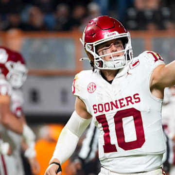 Oklahoma quarterback John Mateer (10) points toward the Oklahoma section after a fourth quarter touchdown during a college football game between Tennessee and Oklahoma in Neyland Stadium.
