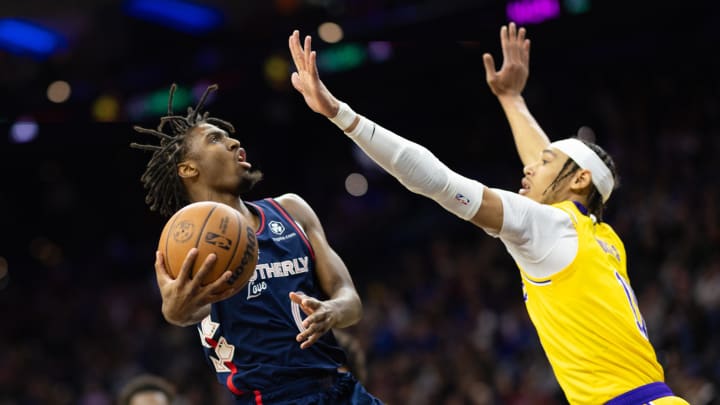 Nov 27, 2023; Philadelphia, Pennsylvania, USA; Philadelphia 76ers guard Tyrese Maxey (0) drives for a shot against Los Angeles Lakers center Jaxson Hayes (11) during the fourth quarter at Wells Fargo Center. Mandatory Credit: Bill Streicher-USA TODAY Sports