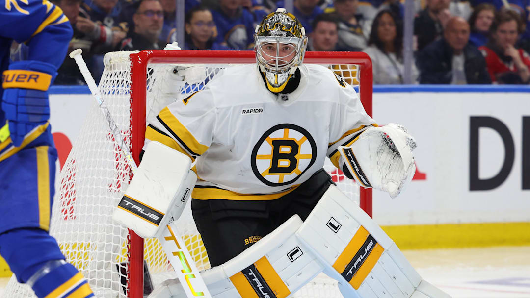 Apr 19, 2026; Buffalo, New York, USA; Boston Bruins goaltender Jeremy Swayman (1) looks for the puck during the second period against the Buffalo Sabres in game one of the first round of the 2026 Stanley Cup Playoffs at KeyBank Center. Mandatory Credit: Timothy T. Ludwig-Imagn Images