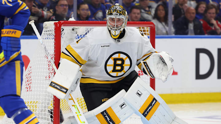 Apr 19, 2026; Buffalo, New York, USA; Boston Bruins goaltender Jeremy Swayman (1) looks for the puck during the second period against the Buffalo Sabres in game one of the first round of the 2026 Stanley Cup Playoffs at KeyBank Center. Mandatory Credit: Timothy T. Ludwig-Imagn Images