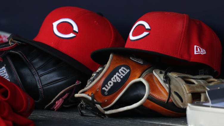 Cincinnati Reds hat and glove