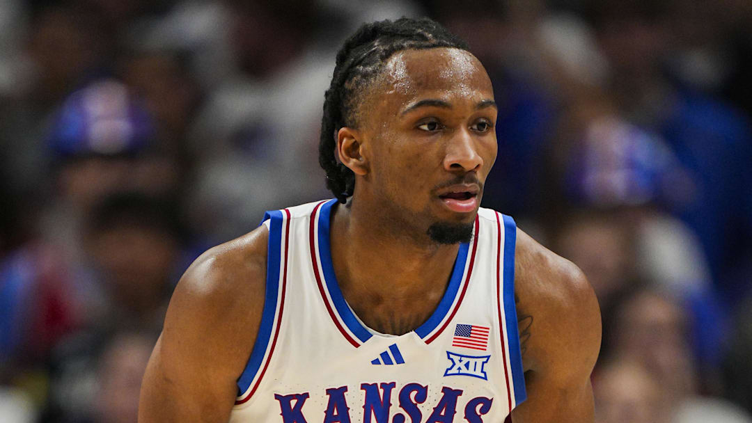Dec 7, 2025; Kansas City, Missouri, USA; Kansas Jayhawks guard Darryn Peterson (22) defends during the first half against the Missouri Tigers at T-Mobile Center. Mandatory Credit: Jay Biggerstaff-Imagn Images
