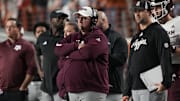 Texas A&M head coach Mike Elko watches the first half of play against the Texas Longhorns at Darrell K Royal-Texas Memorial Stadium.