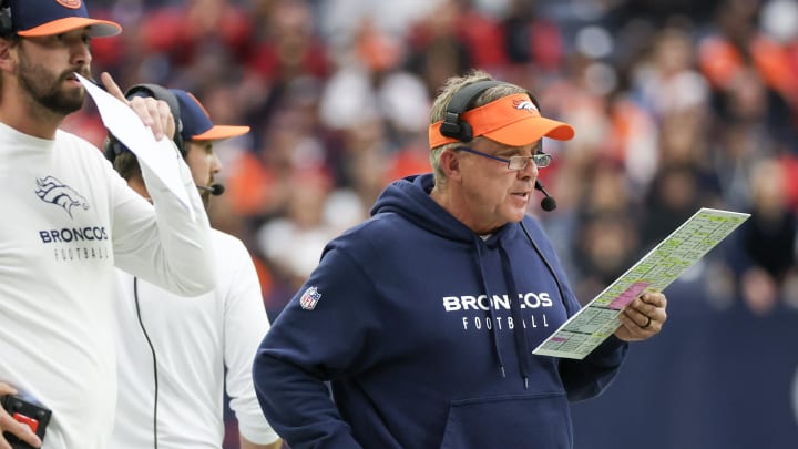 Dec 3, 2023; Houston, Texas, USA; Denver Broncos head coach Sean Payton looks at his play card while the Broncos play against the Houston Texans in the second quarter at NRG Stadium. 