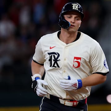 Aug 2, 2024; Arlington, Texas, USA; Texas Rangers shortstop Corey Seager (5) runs the bases after hitting a home run during the first inning against the Boston Red Sox at Globe Life Field. Mandatory Credit: Kevin Jairaj-Imagn Images