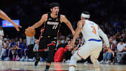 Oct 26, 2025; Miami, Florida, USA; Miami Heat forward Jaime Jaquez Jr. (11) drives to the basket against New York Knicks guard Josh Hart (3) during the first quarter at Kaseya Center. Mandatory Credit: Sam Navarro-Imagn Images