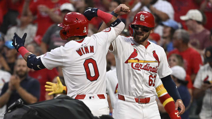 Jul 26, 2024; St. Louis, Missouri, USA; St. Louis Cardinals shortstop Masyn Winn (0) celebrates with center fielder Michael Siani (63) after hitting a two-run home run against the Washington Nationals during the third inning at Busch Stadium. Mandatory Credit: Jeff Le-USA TODAY Sports