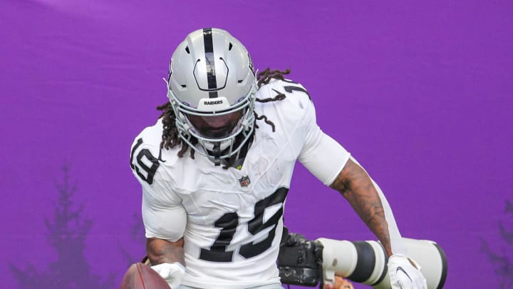 Aug 10, 2024; Minneapolis, Minnesota, USA; Las Vegas Raiders wide receiver DJ Turner (19) celebrates his touchdown against the Minnesota Vikings in the second quarter at U.S. Bank Stadium. Mandatory Credit: Brad Rempel-USA TODAY Sports