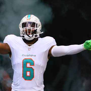 Miami Dolphins linebacker Anthony Walker Jr. runs onto the field before the game against the Jacksonville Jaguars.