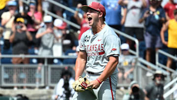 Arkansas Razorbacks starting pitcher Gage Wood (14) celebrates completing a no hitter against the Murray State Racers at Charles Schwab Field. 