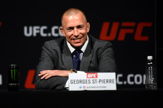 Georges St-Pierre speaks during a press conference to promote his middleweight title bout against Michael Bisping.